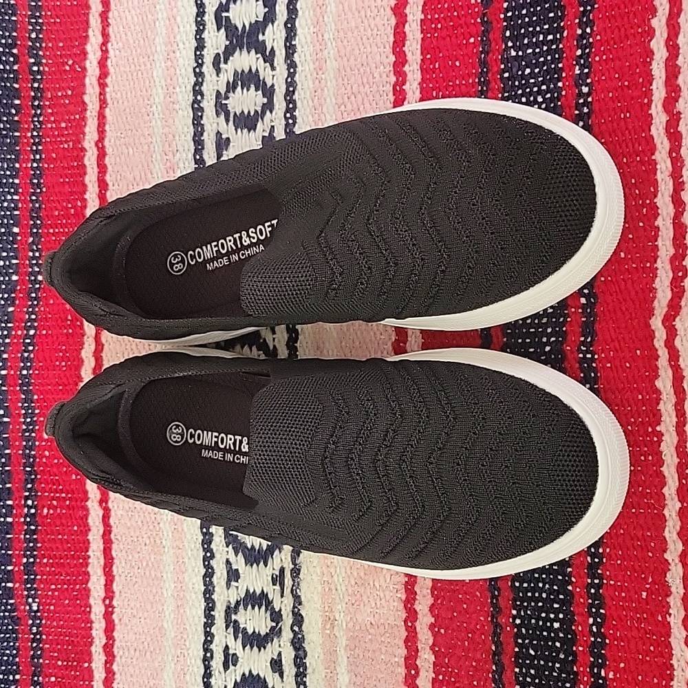 Black slip on sneakers